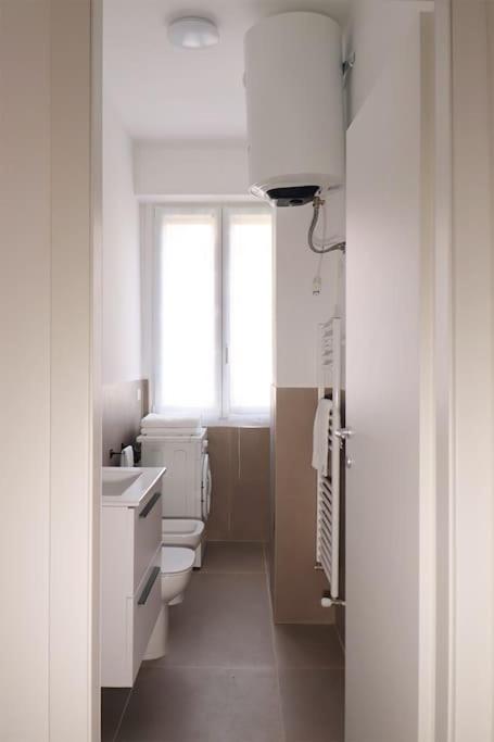 Bilocale Metro 4 Blu Frattini - Airport Linate Apartment มิลาน ภายนอก รูปภาพ